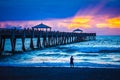 Fishing on and under the Juno Beach Fishing Pier Royalty Free Stock Photo