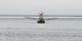 Fishing vessel George Allen in the gloom of Grays Harbor Washington