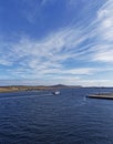 A Fishing Vessel heading into the Fishing Quay at Lerwick Harbour in sunny April Weather.