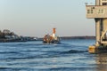 Fishing vessel Sunlight passing railroad bridge on Cape Cod Canal Royalty Free Stock Photo