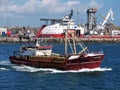 Fishing Boat Leaving Port to Sea. Royalty Free Stock Photo