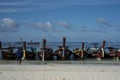 Fishing wooden rowing boats are parked on the beach on Koh Lipe, Thailand.