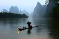fishman in Lijiang river dawn Royalty Free Stock Photo