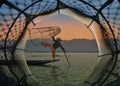 Fishman and net in Canoe Royalty Free Stock Photo