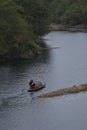 Fishman rowing boat in canoe Lantern Royalty Free Stock Photo