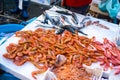 Shrimps and fish on local fishmarket Royalty Free Stock Photo