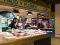 fishmonger and market stall with fresh seafood in the Alicante market hall