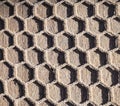 Fishnet on brown wooden floor or deÃÂk. Mesh fabric. Fishing net background