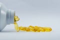 Fishoil capsule from bottle Royalty Free Stock Photo