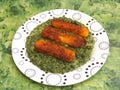 Fishsticks with spinach Royalty Free Stock Photo