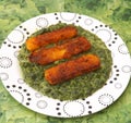Fishsticks with spinach Royalty Free Stock Photo