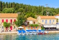 FISKARDO PORT, KEFALONIA ISLAND, GREECE - SEP 19, 2014: traditional greek houses in port of Fiskardo village. This town is most Royalty Free Stock Photo