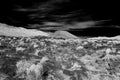 Fissile Falls rocky desert landscape in black and white with black sky Royalty Free Stock Photo