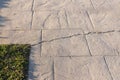 Fissured stamped concrete pavement outdoor, appearance colors and textures of paving slate stone tile on cement