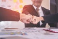 Fist bump in business meeting for team concept Royalty Free Stock Photo