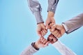 Fist bump, celebrate and business team hands winning together due to support, unity and teamwork against a sky Royalty Free Stock Photo