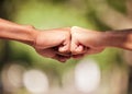 Fist bump, hands and teamwork, support or collaboration for team building, solidarity or unity. Hand connection Royalty Free Stock Photo