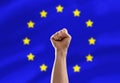 fist or hand punching air over european union flag Royalty Free Stock Photo