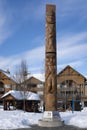 Olympic lightning welcome figure wooden carving in Whistler village Royalty Free Stock Photo