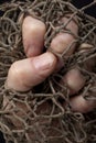 Fist in net Royalty Free Stock Photo