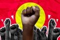 Fist, protest and fighting for human rights with people on a red background together to rally a crowd. Hands, power and