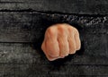 Fist punch through rock wall Royalty Free Stock Photo