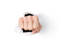 Fist punching through the hole Royalty Free Stock Photo