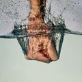 Fist Punching Water in Anger Royalty Free Stock Photo