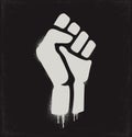 Fist raised in protest. Fist icon isolated on a dark background. Vector illustration