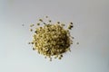 Fistful of yellow shelled hemp seeds Royalty Free Stock Photo