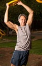 Senior Man Doing Squats Outdoors Royalty Free Stock Photo