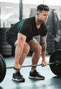 Fit, active and strong man with barbell weight for lifting in gym workout, exercise and training. Serious, motivated and