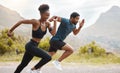 Fit african american couple running outdoors while exercising. Young athletic man and woman training to improve their Royalty Free Stock Photo