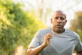 Fit African American man running. Royalty Free Stock Photo