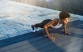 Woman doing push ups outdoor Royalty Free Stock Photo