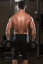 Fit Athlete Doing Exercise For Trapezius