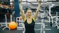 Fit Athletic Woman Exercises with Dumbbell. Bodypositive Girl with Beautiful Hairy Armpits. Sweat smell. Royalty Free Stock Photo