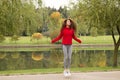 A fit and athletic young woman is skipping with a jump rope in the park Royalty Free Stock Photo