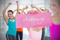 Fit blonde holding card saying challenge