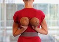 Fit business woman with two coconuts Royalty Free Stock Photo