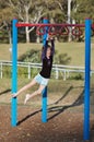 Fit child on monkey bars