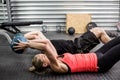 Fit couple doing abdominal ball exercise Royalty Free Stock Photo