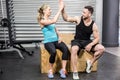 Fit couple doing high five