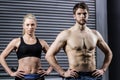 Fit couple with hands on the hips Royalty Free Stock Photo