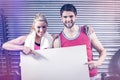 Fit couple holding blank paper Royalty Free Stock Photo