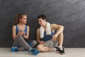 Fit couple with smartphone listening to music Royalty Free Stock Photo
