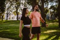 Fit couple recreationally walking in the park Royalty Free Stock Photo