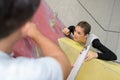 Fit couple rock climbing indoors at gym Royalty Free Stock Photo