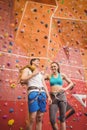 Fit couple at the rock climbing wall Royalty Free Stock Photo