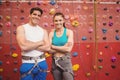 Fit couple at the rock climbing wall Royalty Free Stock Photo